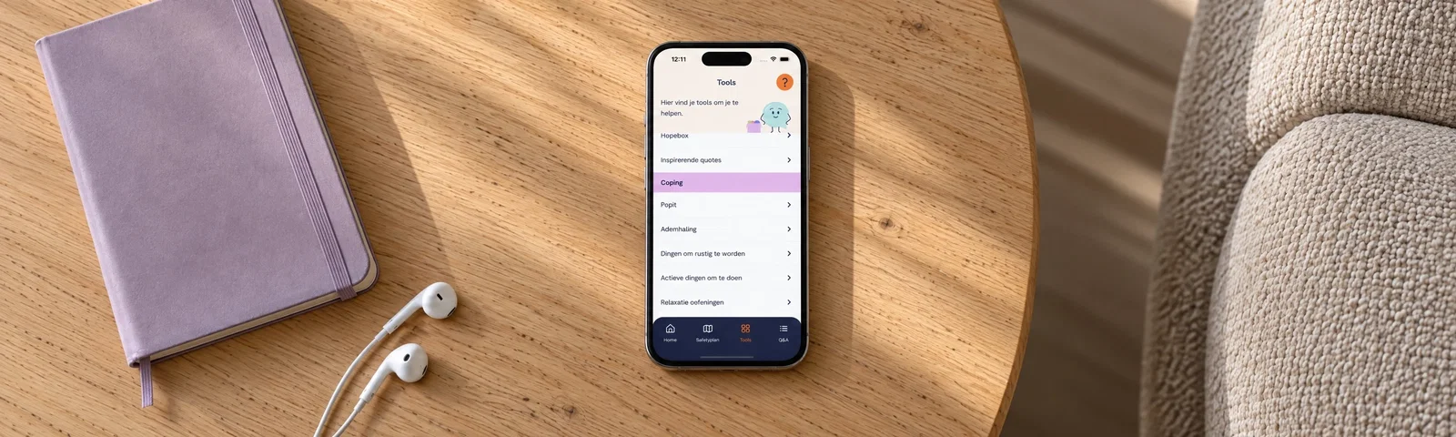 Spark* tools on a smartphone beside a notebook and earphones.