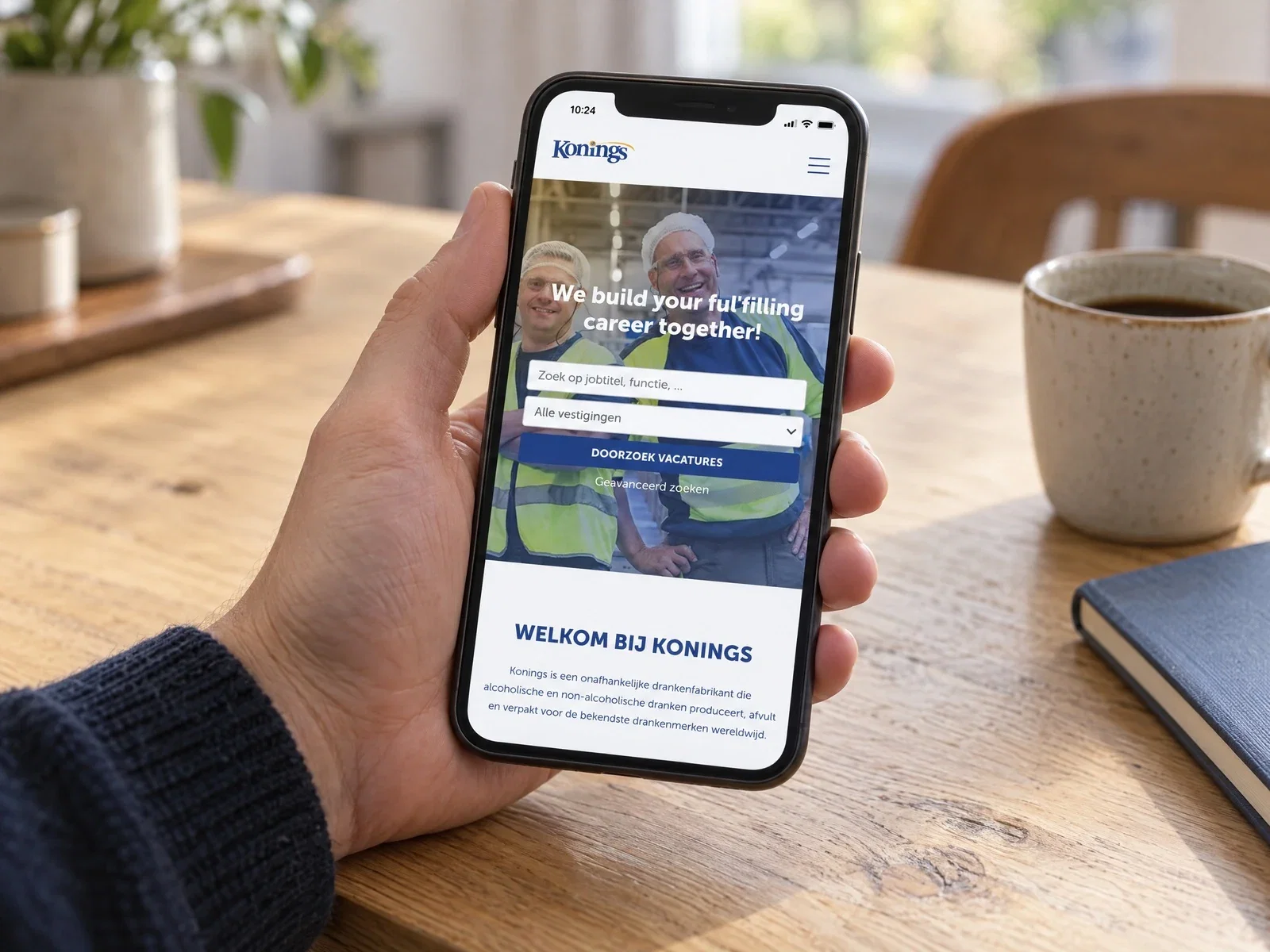 The Konings careers website on a smartphone, showing employees and vacancies.