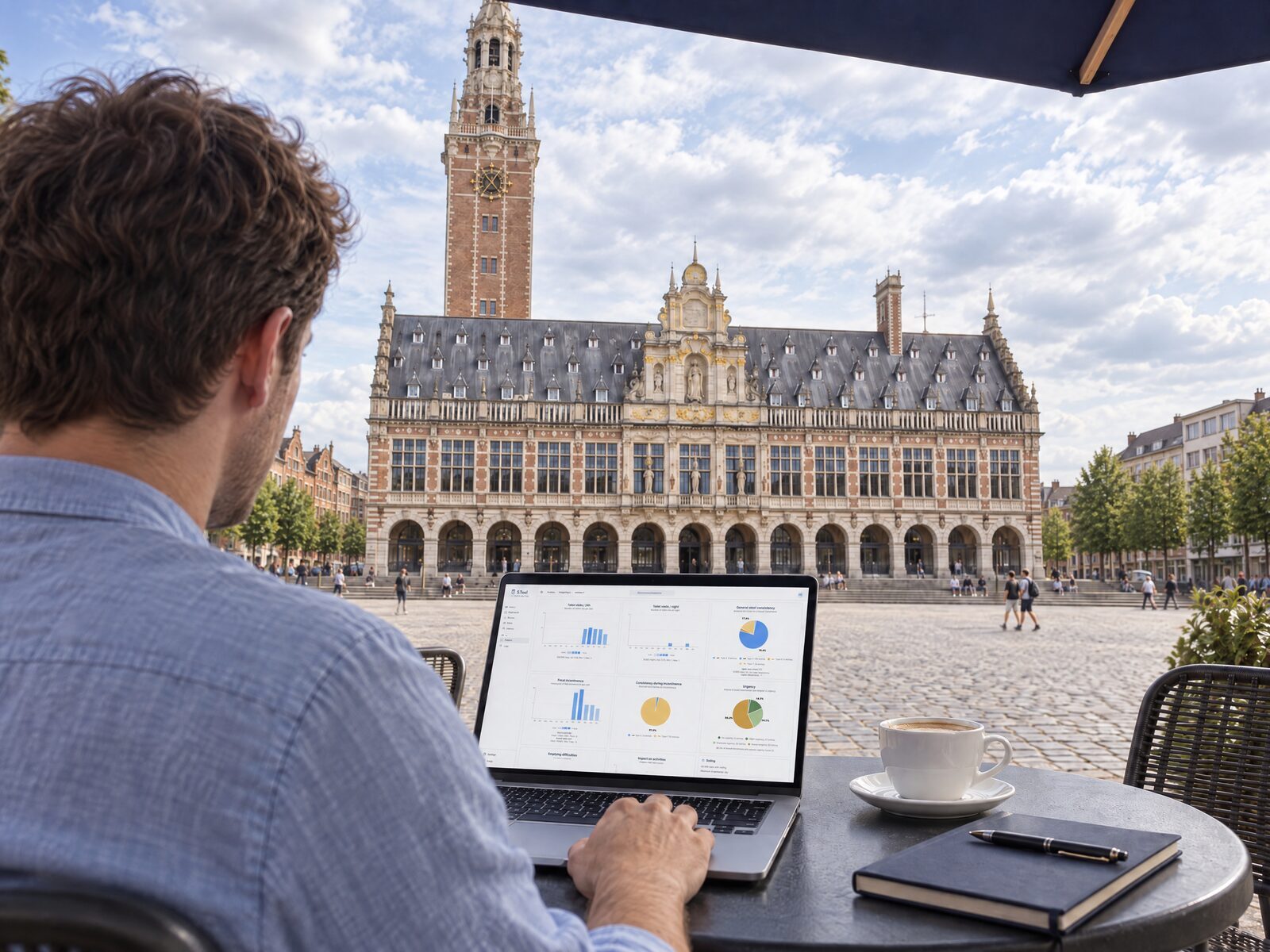 Someone working on the S.Tool research environment on a terrace in front of the University Library in Leuven