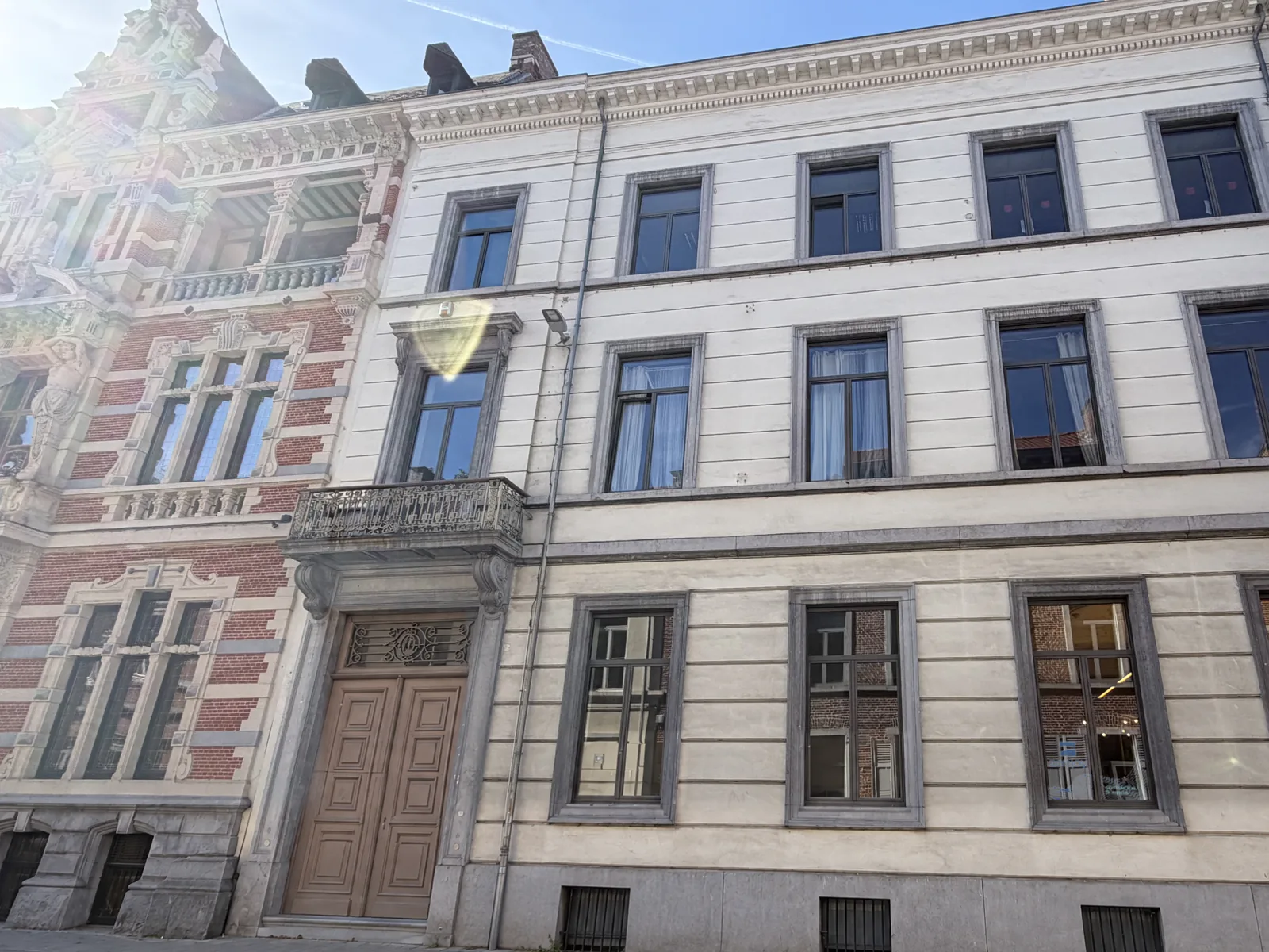 Gevel van het kantoor van Zenjoy aan de Blijde Inkomststraat in Leuven
