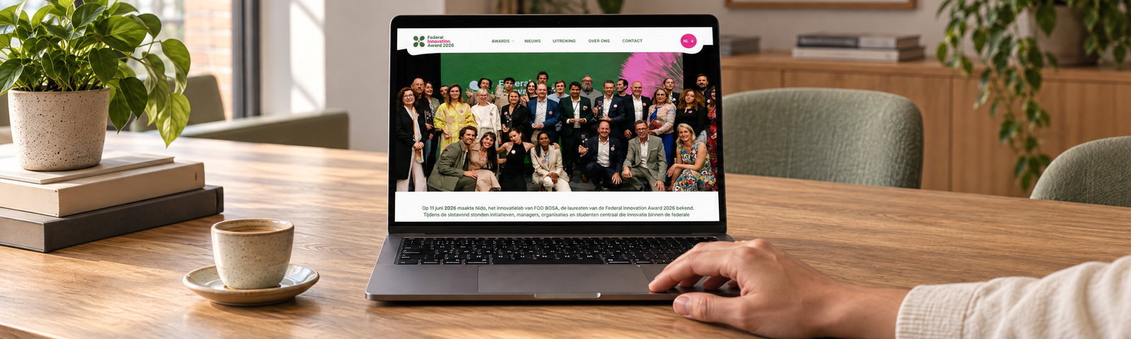 Someone using the Federal Innovation Award website on a laptop